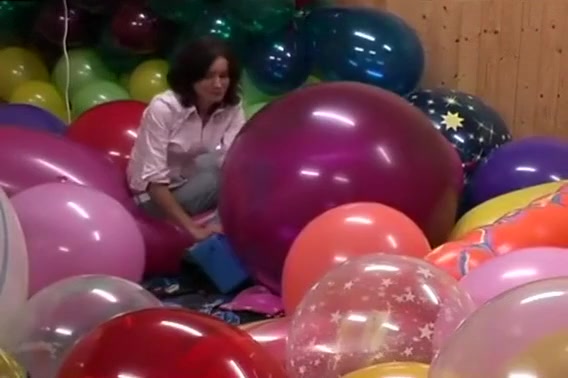 Single woman around balloons