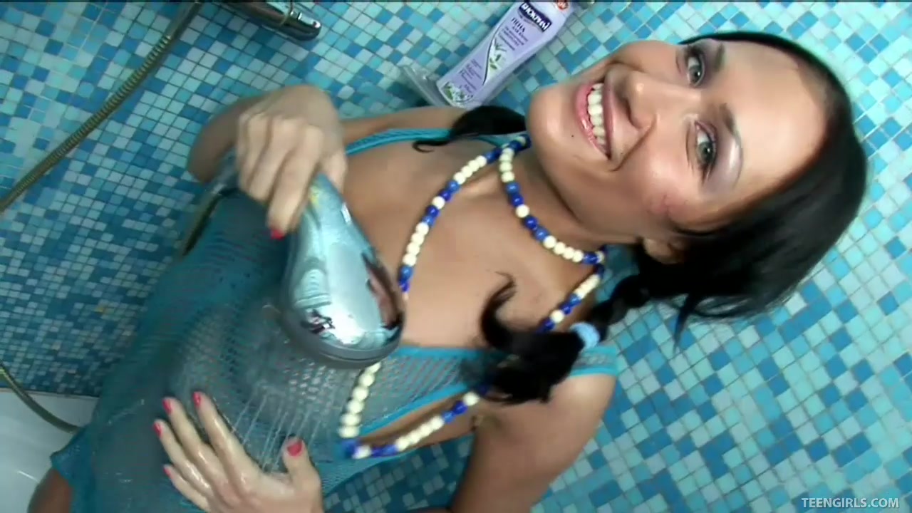 Sexy Brunette Nila Experiments With A Waterproof Toy