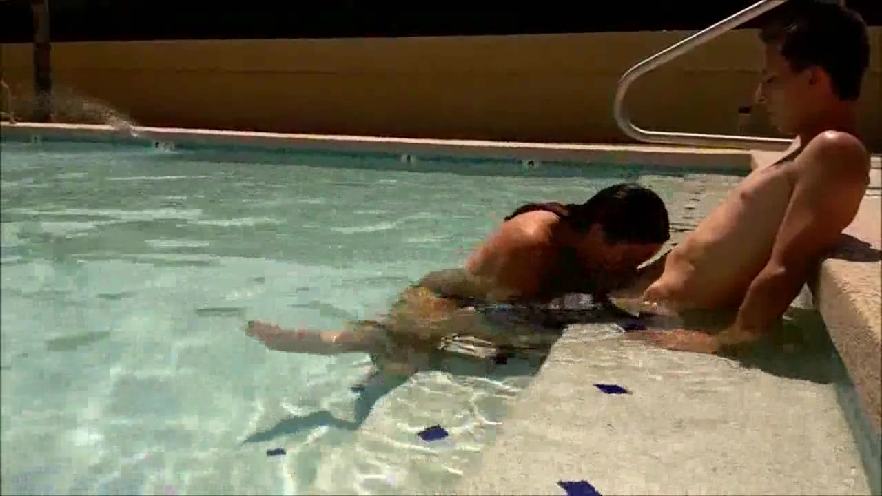 Horny couple having oral sex in the pool
