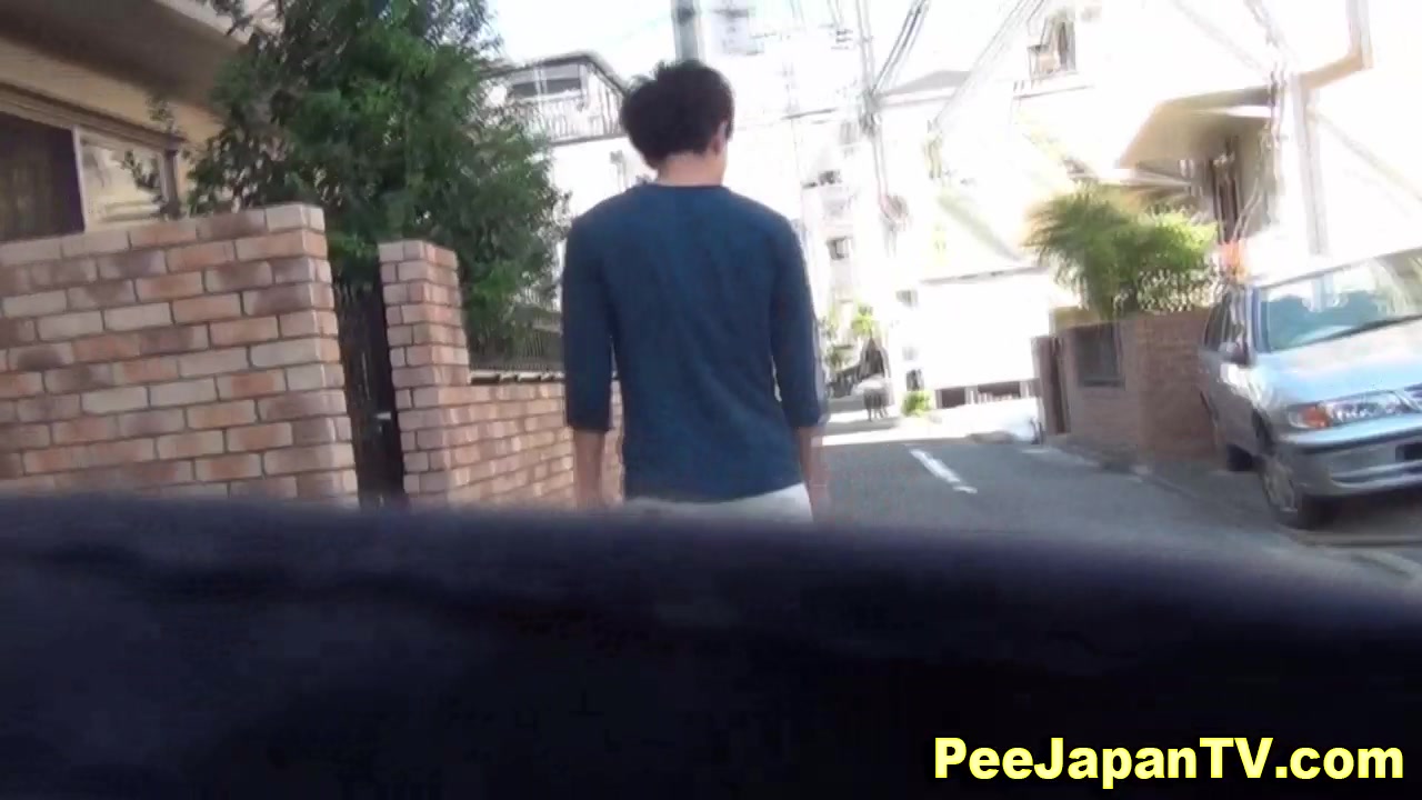 Asian teen squats to piss in public