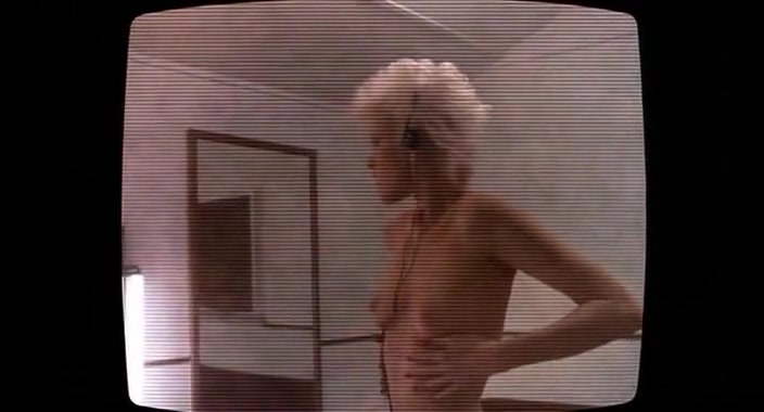 Barbara Crampton,Melanie Griffith in Body Double (1984)