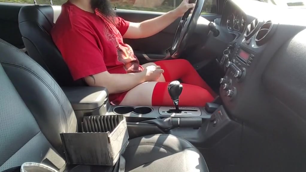 Driving and stroking in red stockings