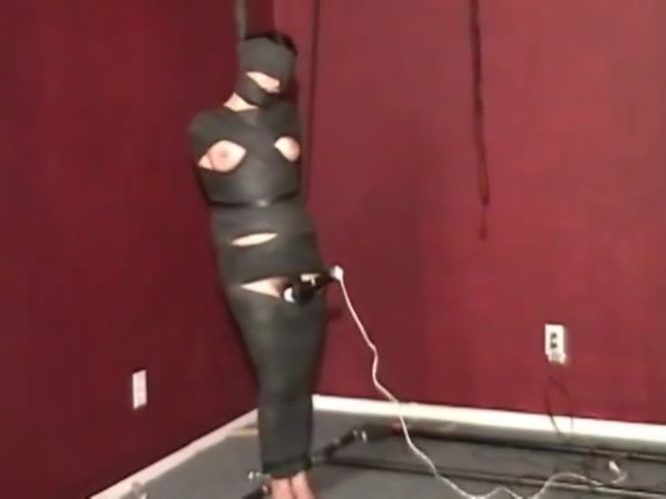 Mummified whore gets nipple tortured and vibrator in cunt